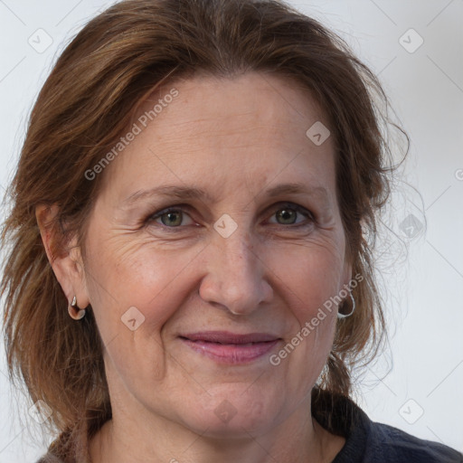 Joyful white adult female with medium  brown hair and brown eyes