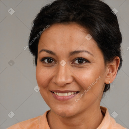 Joyful white adult female with medium  brown hair and brown eyes