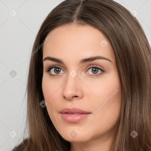 Neutral white young-adult female with long  brown hair and brown eyes