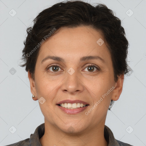 Joyful white adult female with short  brown hair and brown eyes