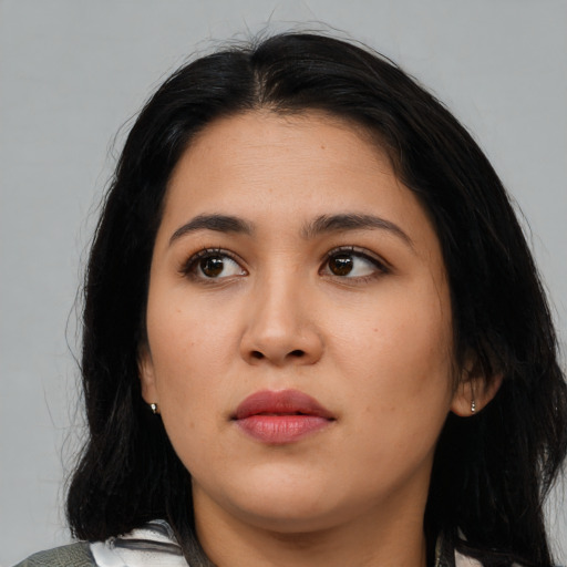 Neutral latino young-adult female with medium  black hair and brown eyes