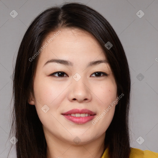 Joyful asian young-adult female with long  brown hair and brown eyes