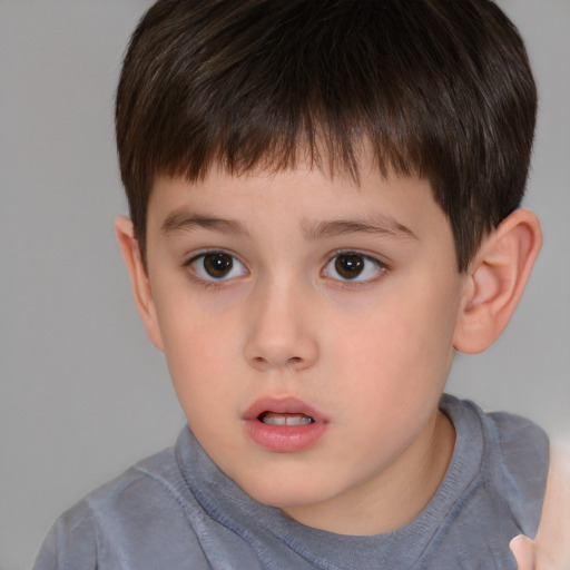 Neutral white child male with short  brown hair and brown eyes