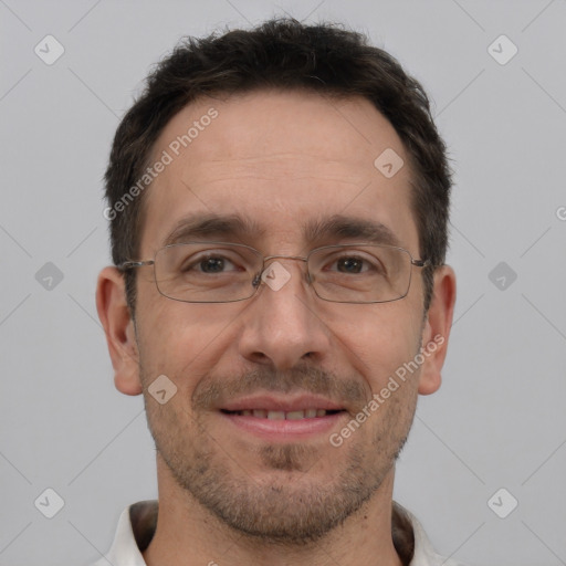 Joyful white adult male with short  brown hair and brown eyes