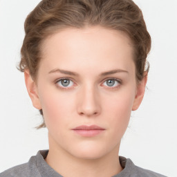 Neutral white young-adult female with short  brown hair and grey eyes