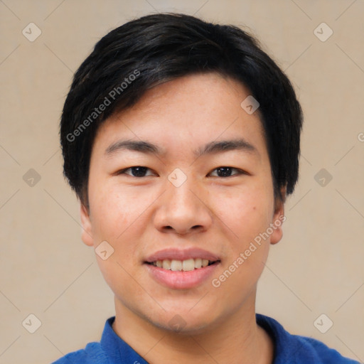 Joyful asian young-adult male with short  black hair and brown eyes