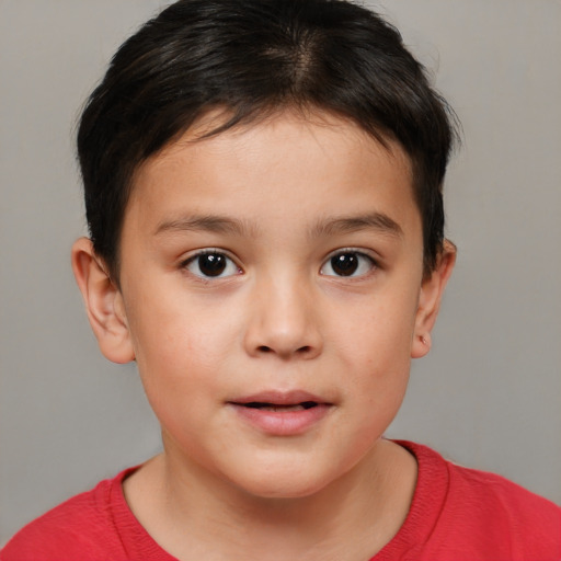 Joyful white child female with short  brown hair and brown eyes