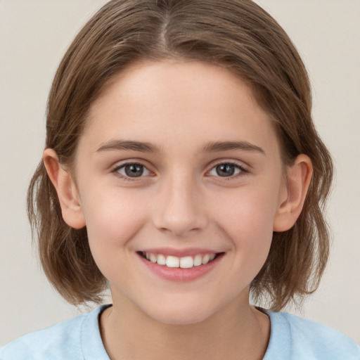 Joyful white child female with medium  brown hair and brown eyes