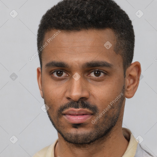 Neutral black young-adult male with short  black hair and brown eyes