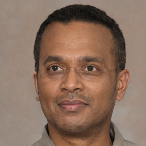 Neutral black adult male with short  black hair and brown eyes
