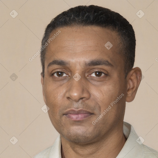 Neutral black adult male with short  black hair and brown eyes