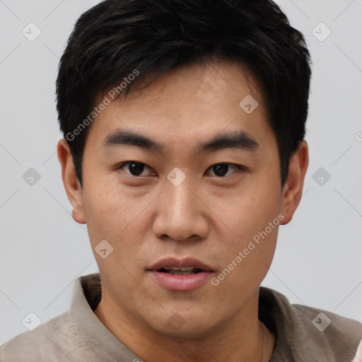 Neutral asian young-adult male with short  black hair and brown eyes
