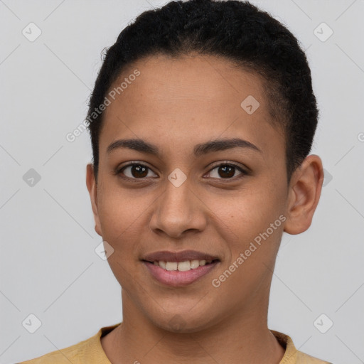 Joyful latino young-adult female with short  brown hair and brown eyes