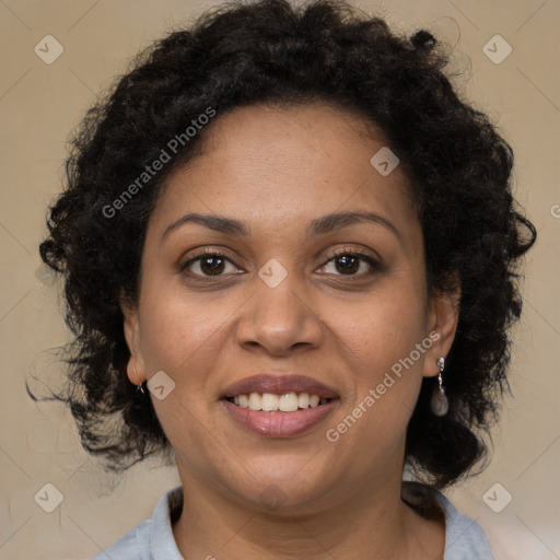 Joyful latino adult female with medium  brown hair and brown eyes