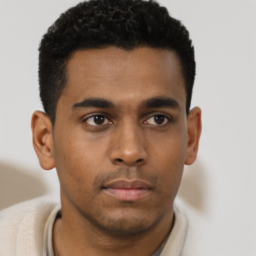 Neutral black young-adult male with short  brown hair and brown eyes