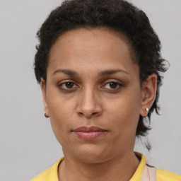 Neutral latino young-adult female with short  brown hair and brown eyes