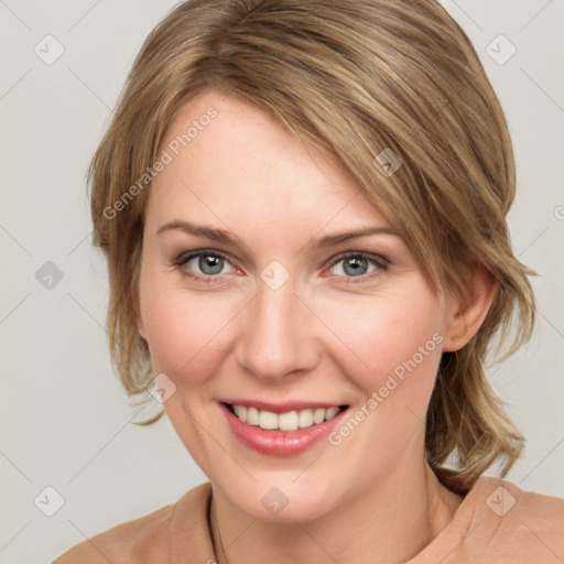 Joyful white young-adult female with medium  brown hair and blue eyes