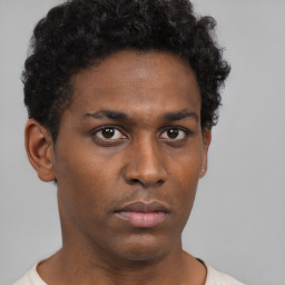 Neutral black young-adult male with short  brown hair and brown eyes