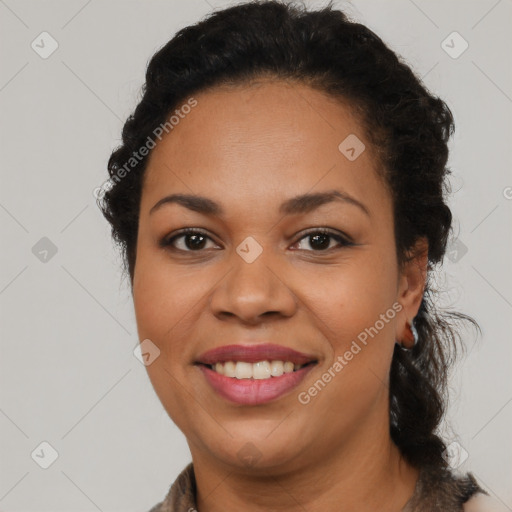 Joyful latino young-adult female with long  brown hair and brown eyes