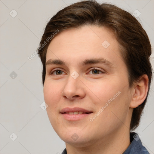 Joyful white young-adult female with short  brown hair and grey eyes