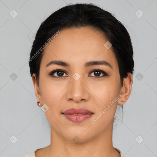 Joyful latino young-adult female with medium  black hair and brown eyes