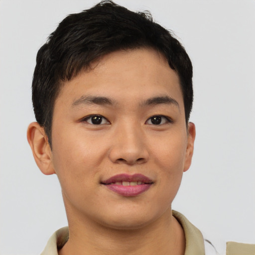 Joyful asian young-adult male with short  brown hair and brown eyes