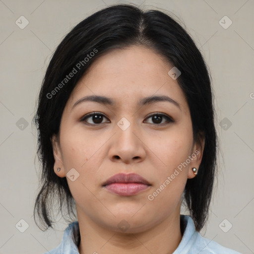 Joyful latino young-adult female with medium  black hair and brown eyes