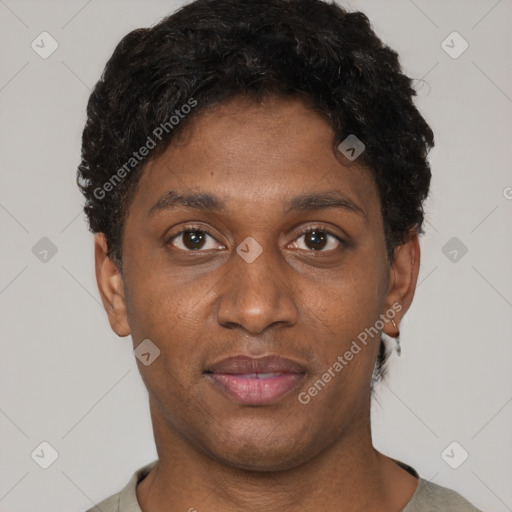Joyful black young-adult male with short  brown hair and brown eyes