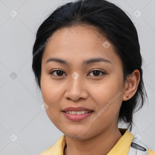 Joyful asian young-adult female with medium  brown hair and brown eyes