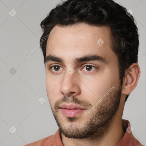 Neutral white young-adult male with short  black hair and brown eyes