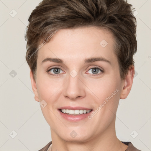 Joyful white young-adult female with short  brown hair and grey eyes