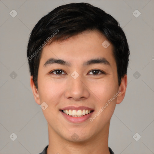 Joyful white young-adult male with short  black hair and brown eyes