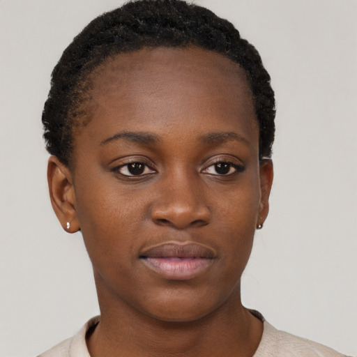 Neutral black young-adult female with short  brown hair and brown eyes