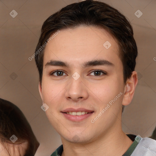 Joyful white young-adult male with short  brown hair and brown eyes