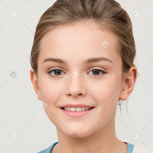 Joyful white child female with medium  brown hair and brown eyes