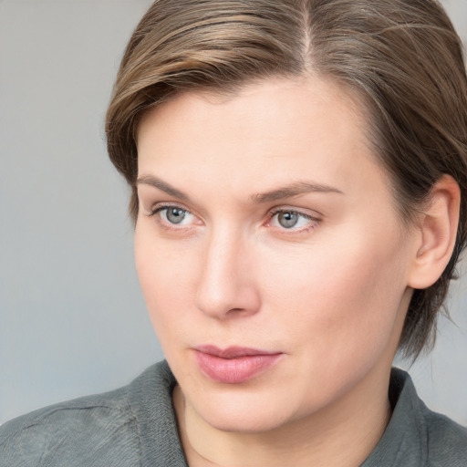 Neutral white young-adult female with medium  brown hair and blue eyes