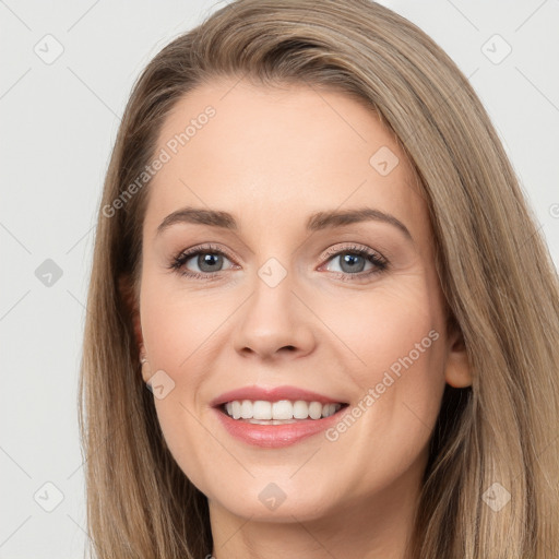 Joyful white young-adult female with long  brown hair and grey eyes