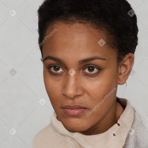 Neutral black young-adult female with short  brown hair and brown eyes