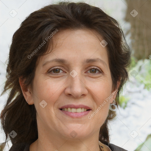 Joyful white adult female with medium  brown hair and brown eyes