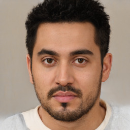 Neutral white young-adult male with short  black hair and brown eyes