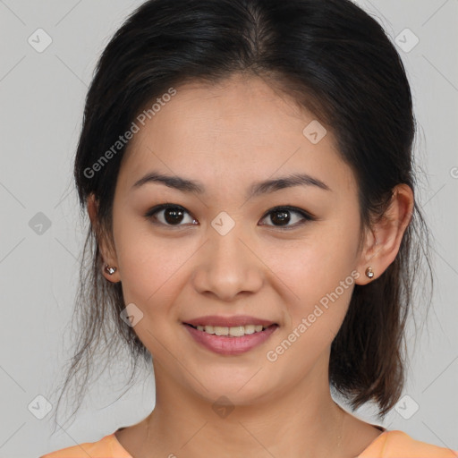 Joyful asian young-adult female with medium  brown hair and brown eyes