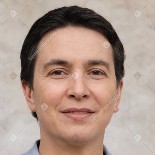 Joyful white adult male with short  brown hair and brown eyes