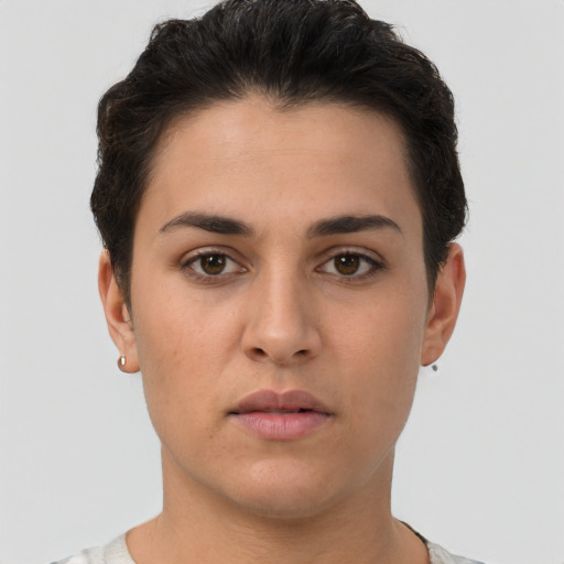 Neutral white young-adult female with short  brown hair and brown eyes