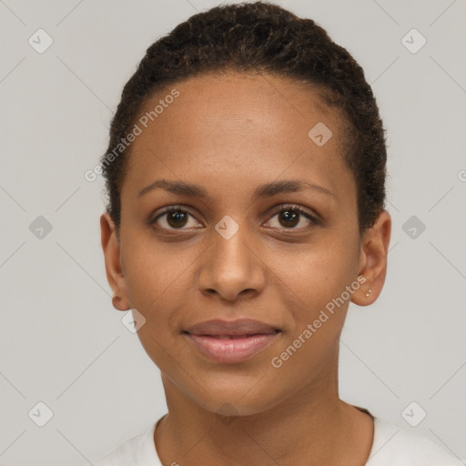 Joyful black young-adult female with short  brown hair and brown eyes