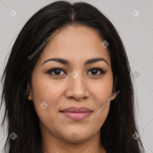 Joyful latino young-adult female with long  brown hair and brown eyes