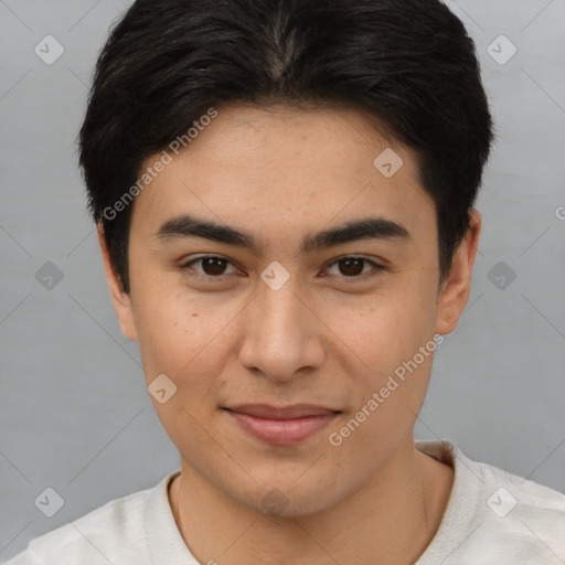 Joyful asian young-adult male with short  brown hair and brown eyes