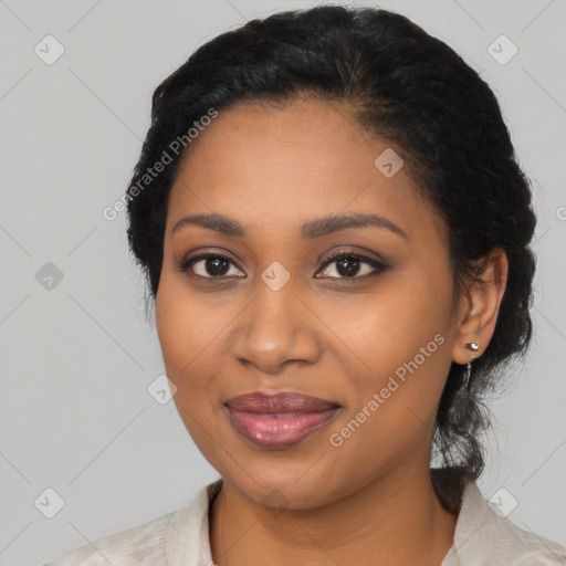 Joyful black young-adult female with medium  black hair and brown eyes