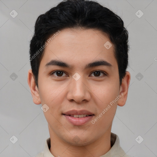 Joyful latino young-adult male with short  brown hair and brown eyes