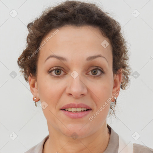 Joyful white adult female with short  brown hair and brown eyes