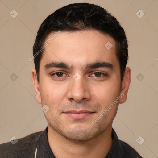 Joyful white young-adult male with short  black hair and brown eyes